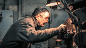 retired worker working in his garage